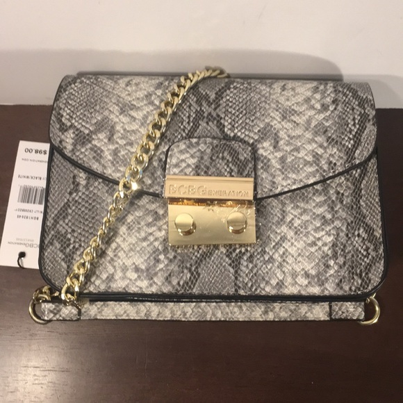 BCBGeneration Handbags - ✨BCBGeneration Snake skin Purse NWT✨